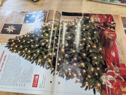 Two petals catalogs presented by Spiegel 1993-1994 special holiday editions