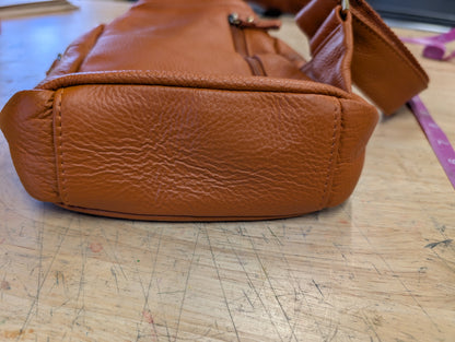 Amerileather petite sling bag burnt orange color