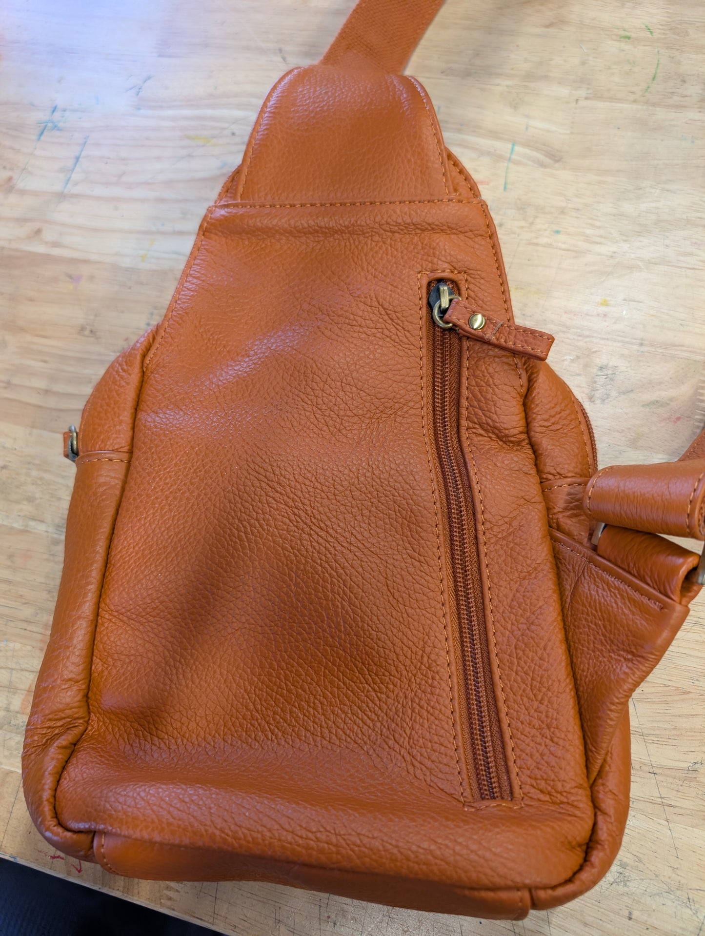 Amerileather petite sling bag burnt orange color